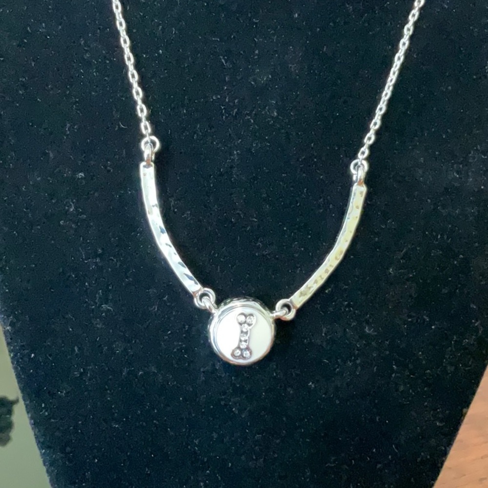 Silver tone bone necklace